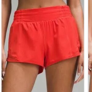 Coral Lululemon Hotty Hot shorts 4” size 4 long